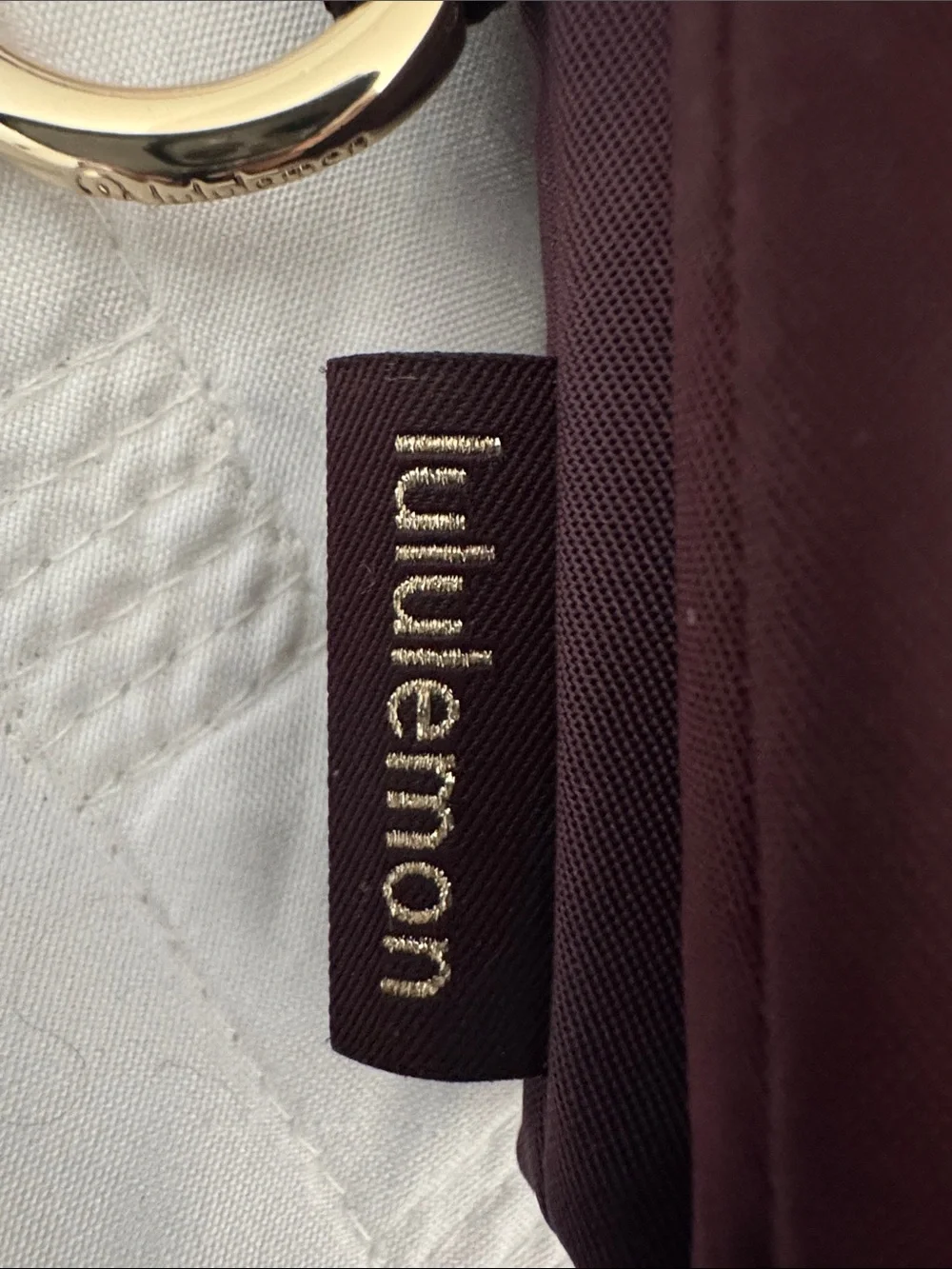 lululemon athletica burgundy key & card holder with gold logo
